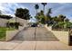Community entrance featuring well-maintained stairs, landscaping, and secure gated access to the neighborhood at 3642 Haverhill St, Las Vegas, NV 89121