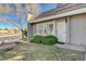 Well-maintained front yard featuring lush greenery, a secure front door, and a view of the street on a sunny day at 3642 Haverhill St, Las Vegas, NV 89121