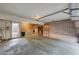 Spacious garage with shelving offers ample storage and convenient access to the home's interior at 3642 Haverhill St, Las Vegas, NV 89121