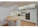 This kitchen has modern appliances, a breakfast bar, and ample counter space at 3642 Haverhill St, Las Vegas, NV 89121
