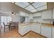 A charming kitchen, dining area and stairway is featured in this listing at 3642 Haverhill St, Las Vegas, NV 89121