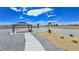 Desert landscaped backyard featuring a gazebo with gravel and cactus accents at 3780 Shawnee Ave, Pahrump, NV 89048