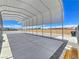 Spacious metal carport with concrete base offers lots of covered parking or storage at 3780 Shawnee Ave, Pahrump, NV 89048