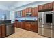 Gourmet kitchen features stainless steel appliances and granite countertops, a culinary enthusiast's dream at 3780 Shawnee Ave, Pahrump, NV 89048