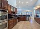 Elegant kitchen featuring stainless steel appliances, granite countertops, and custom cabinets for a luxurious feel at 3780 Shawnee Ave, Pahrump, NV 89048