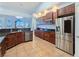 Gourmet kitchen with stainless steel appliances, granite countertops, and custom cabinetry offers a chef's dream at 3780 Shawnee Ave, Pahrump, NV 89048
