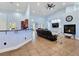 Bright living room boasts a fireplace and comfortable seating, perfect for relaxation and entertaining guests at 3780 Shawnee Ave, Pahrump, NV 89048