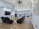 Spacious living room with a fireplace, TV, comfortable seating, and access to the outdoor area at 3780 Shawnee Ave, Pahrump, NV 89048