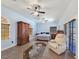 Spacious main bedroom suite featuring a sitting area, two ceiling fans, and lots of natural light at 3780 Shawnee Ave, Pahrump, NV 89048