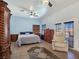 Spacious main bedroom suite featuring a sitting area, lots of natural light, and beautiful decor at 3780 Shawnee Ave, Pahrump, NV 89048