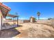 Fenced backyard with patio at 403 Woodridge Dr, Henderson, NV 89015