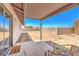 View of a spacious backyard area from the covered patio, ready for landscaping and customization at 403 Woodridge Dr, Henderson, NV 89015