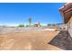 Expansive backyard, enclosed by a block wall, ready for landscaping or outdoor activities at 403 Woodridge Dr, Henderson, NV 89015