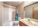 Cozy bathroom featuring a shower-tub combination and a neutral color scheme at 403 Woodridge Dr, Henderson, NV 89015