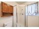 This bathroom has a toilet, vanity and shower at 403 Woodridge Dr, Henderson, NV 89015