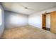 Spacious bedroom with neutral walls and carpet at 403 Woodridge Dr, Henderson, NV 89015
