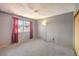 Bedroom featuring a window for natural light and standard closet at 403 Woodridge Dr, Henderson, NV 89015