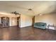 Traditional living room features dark wood floors and a decorative china cabinet at 403 Woodridge Dr, Henderson, NV 89015