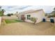 Well-maintained backyard featuring artificial turf, low-maintenance landscaping and a quaint patio at 434 Viewmont Dr, Henderson, NV 89015