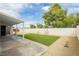 Cozy backyard featuring artificial turf, gravel landscaping, and block wall at 434 Viewmont Dr, Henderson, NV 89015