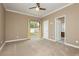 A spacious bedroom featuring neutral tones, plush carpeting, and a ceiling fan at 434 Viewmont Dr, Henderson, NV 89015