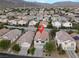 Aerial view of a neighborhood with a red marker indicating the property's location in a residential community at 4439 Yellow Harbor St, Las Vegas, NV 89129