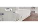Carpeted loft area with view of community at 4439 Yellow Harbor St, Las Vegas, NV 89129