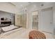 Luxurious bathroom featuring a jacuzzi tub, glass shower, and a spacious walk-in closet at 4515 Dean Martin Dr # 200, Las Vegas, NV 89103