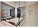 Spa-like bathroom featuring a soaking tub and separate glass shower, all with luxurious finishes at 4515 Dean Martin Dr # 200, Las Vegas, NV 89103