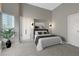 This bedroom features neutral walls, plush carpet, and a large window to allow natural light to enter the room at 4515 Dean Martin Dr # 200, Las Vegas, NV 89103