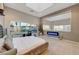 Bright bedroom boasts carpeted floors, modern fireplace, comfortable bed, and an amazing view at 4515 Dean Martin Dr # 200, Las Vegas, NV 89103