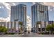 Striking exterior shot of luxury high-rise condominium towers with palm trees and well-maintained landscaping at 4515 Dean Martin Dr # 200, Las Vegas, NV 89103