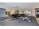 Weight room with a mirror, weights, workout bench, and fitness center bulletin board at 4515 Dean Martin Dr # 200, Las Vegas, NV 89103