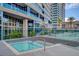 Outdoor hot tub area with contemporary glass railings at 4515 Dean Martin Dr # 200, Las Vegas, NV 89103