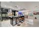 Gourmet kitchen with stainless steel appliances, granite countertops, and a breakfast bar at 4515 Dean Martin Dr # 200, Las Vegas, NV 89103