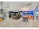 Modern kitchen with a large island, bar seating, and a stunning saltwater aquarium at 4515 Dean Martin Dr # 200, Las Vegas, NV 89103