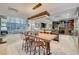 Open concept kitchen with an island and breakfast bar is open to the dining and living spaces at 4515 Dean Martin Dr # 200, Las Vegas, NV 89103