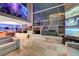 Open-concept living area with modern furnishings, large windows, and city views at 4515 Dean Martin Dr # 200, Las Vegas, NV 89103