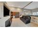 Comfortable living room featuring a sleek entertainment center and Murphy bed at 4515 Dean Martin Dr # 200, Las Vegas, NV 89103
