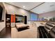 Cozy living area showcasing a Murphy bed, built-in storage, and a stylish bar area at 4515 Dean Martin Dr # 200, Las Vegas, NV 89103