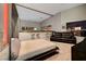 Modern living room with a pull-down bed and a sleek black leather couch at 4515 Dean Martin Dr # 200, Las Vegas, NV 89103