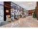 Lobby sitting area with comfortable armchairs and decorative shelving at 4515 Dean Martin Dr # 200, Las Vegas, NV 89103