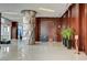 Spacious lobby featuring modern art, wood paneling, and stylish furniture, offering a welcoming atmosphere at 4515 Dean Martin Dr # 200, Las Vegas, NV 89103