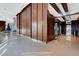 Open lobby featuring glossy floors, wood wall paneling, and an elevator bank for convenient access at 4515 Dean Martin Dr # 200, Las Vegas, NV 89103