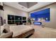 Spacious main bedroom with a large window view and modern fireplace at 4515 Dean Martin Dr # 200, Las Vegas, NV 89103