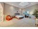 Spacious main bedroom with a luxurious bed, sitting area, and city views at 4515 Dean Martin Dr # 200, Las Vegas, NV 89103