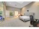 Inviting main bedroom with a king-size bed, workspace, and ample natural light at 4515 Dean Martin Dr # 200, Las Vegas, NV 89103