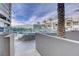 Relaxing outdoor pool area with comfortable lounge chairs and glass fencing, offering a serene retreat at 4515 Dean Martin Dr # 200, Las Vegas, NV 89103