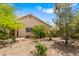Backyard view of a home featuring desert landscaping at 4517 Rodman Dr, Las Vegas, NV 89130