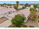 Beautiful home with a well-manicured lawn, mature tree, and a two-car garage in a desirable neighborhood at 4517 Rodman Dr, Las Vegas, NV 89130